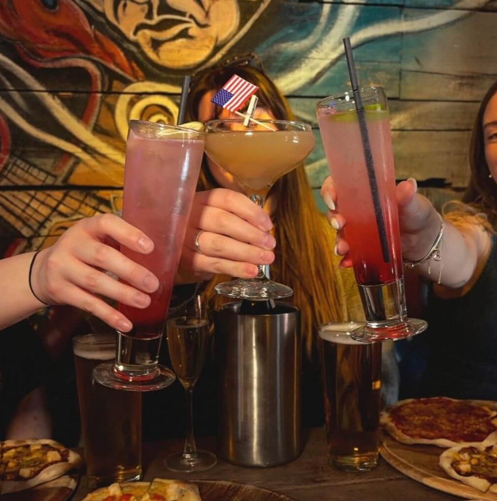 Girls enjoying bottomless brunch at Mean-Eyed Cat Leeds